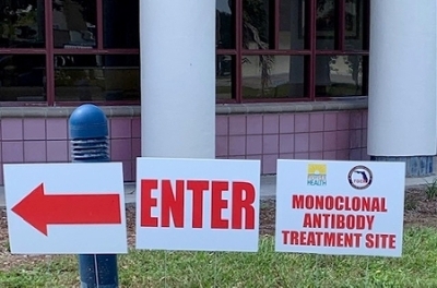 Image of signage for Monoclonal Antibody Therapy in Okeechobee.